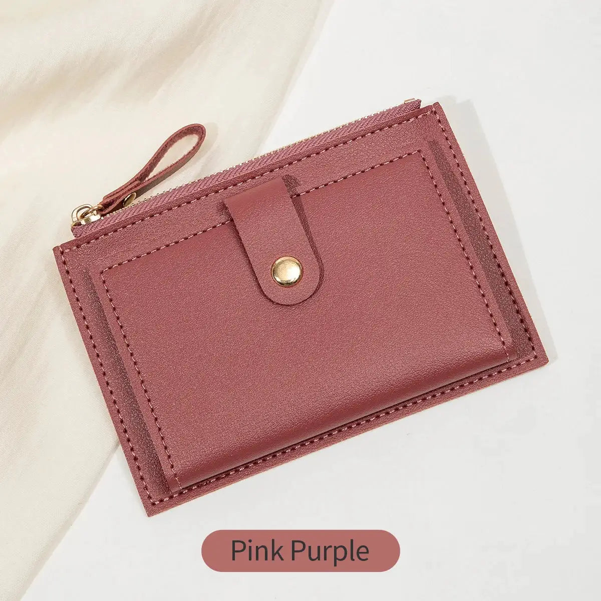 Women's minimalist pink-purple PU leather card wallet with zipper and snap strap