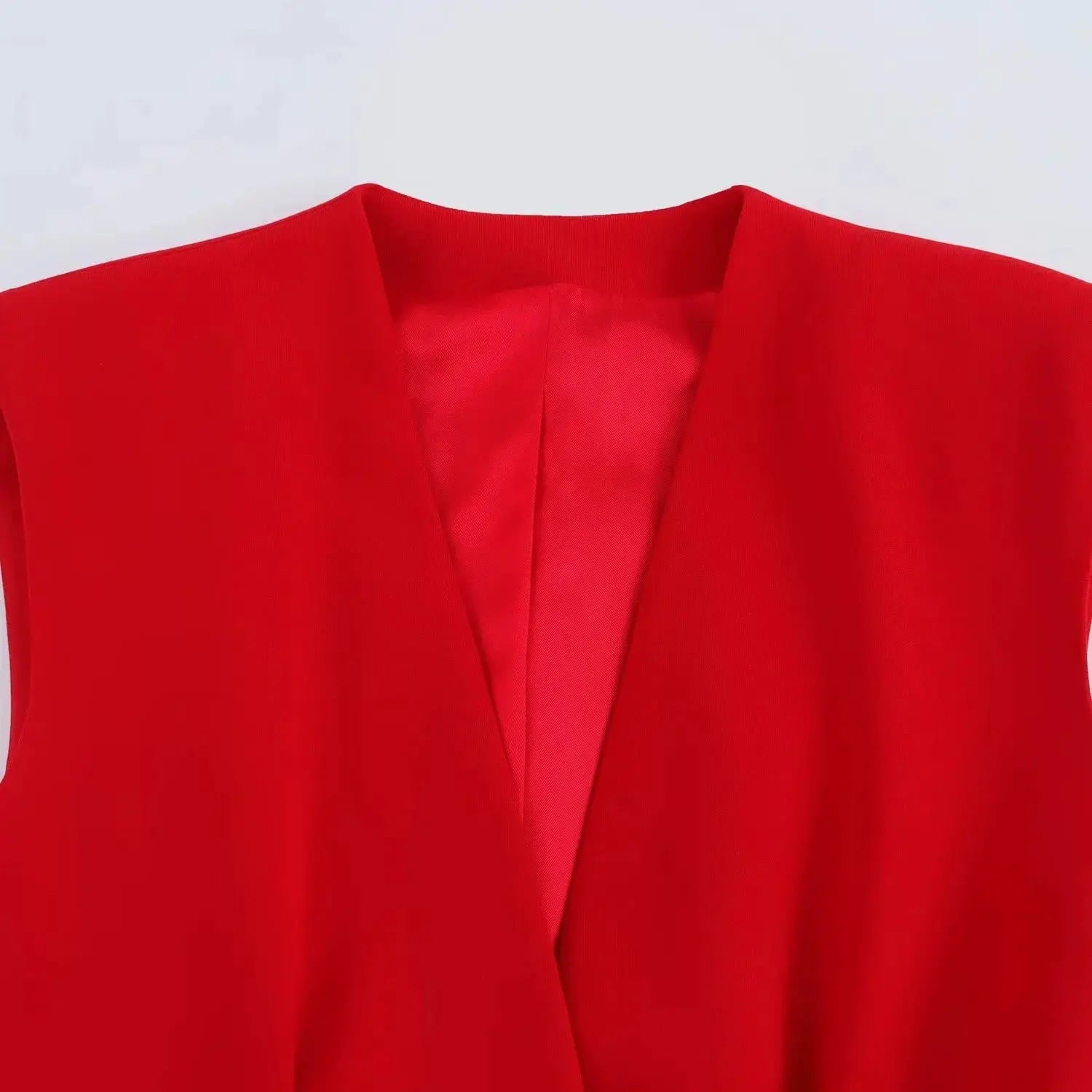 Red sleeveless blazer vest with V-neck, tailored officewear style