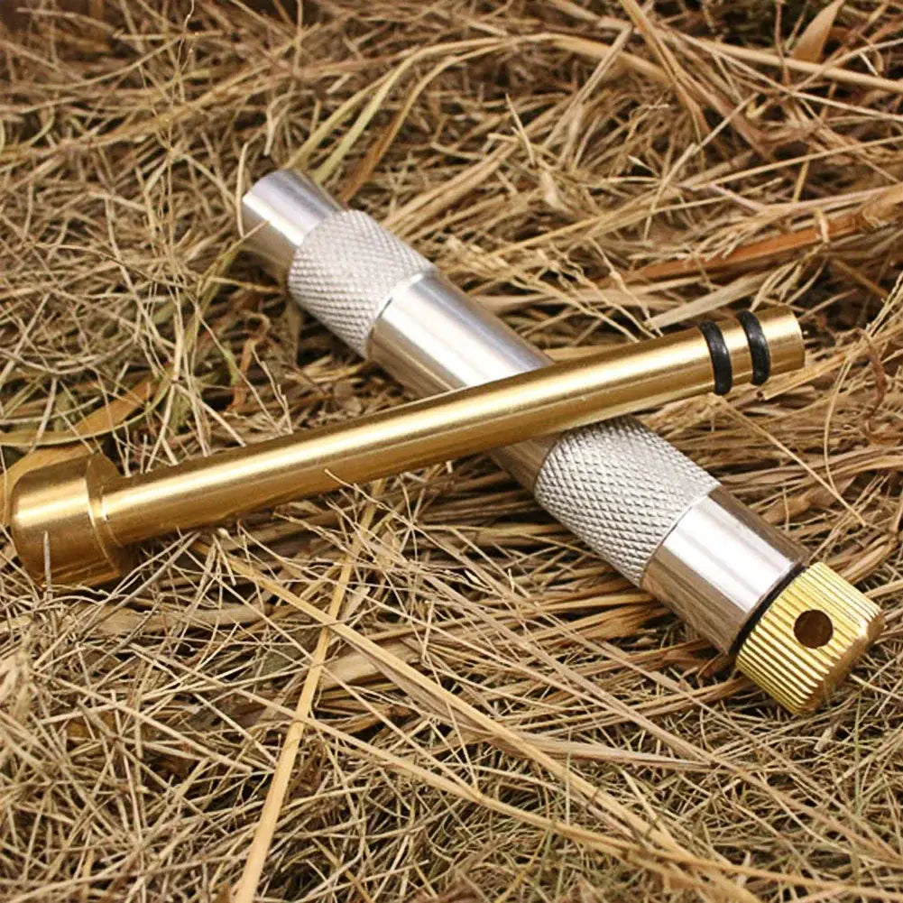 Brass emergency fire-start tube and silver ignition tool with knurled grip, camping survival gear (2 pieces)