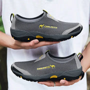 Men's mesh slip-on outdoor shoes by Simples Market, grey with yellow accents, breathable pair