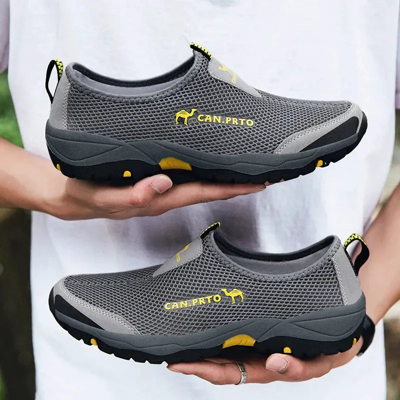 Men's mesh slip-on outdoor shoes by Simples Market, grey with yellow accents, breathable pair