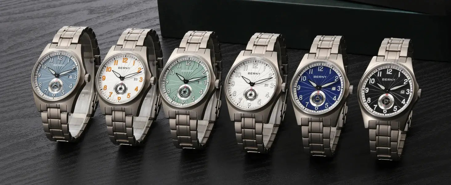 Six BERNY titanium automatic wristwatches on metal bracelets with blue, white, green, and black dials.