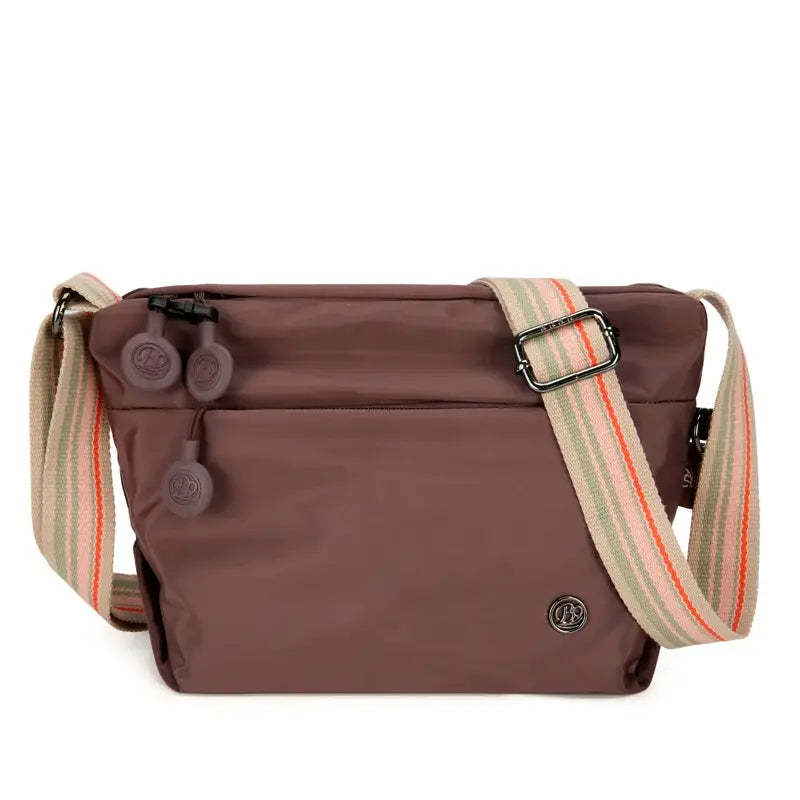 Ultra-light nylon crossbody bag by Simples Market with adjustable striped strap, mauve color, zipper closure