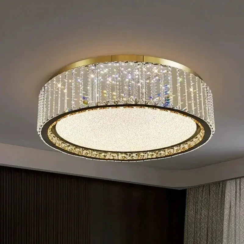 Light Luxury Crystal Ceiling Lamp by Simples Market, circular gold frame with hanging crystal strands.