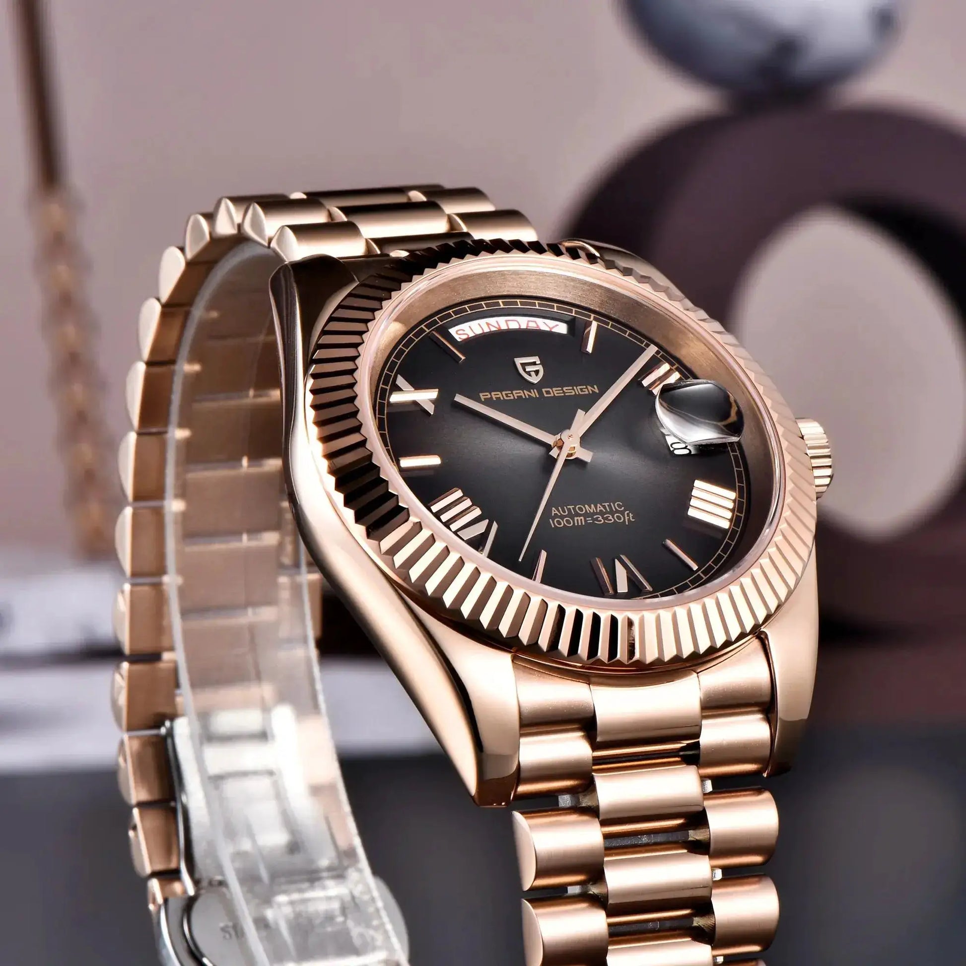 Pagani Design rose-gold automatic men's watch with stainless steel bracelet and 100m water resistance