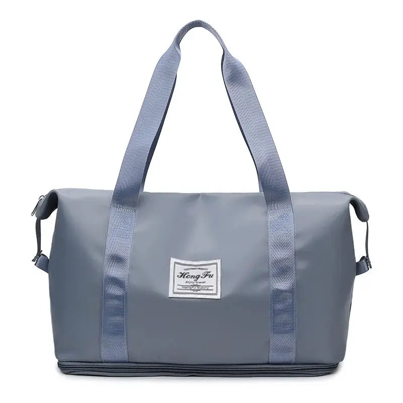 UNIXINU carry-on nylon waterproof duffle bag by Simples Market in gray with light-blue straps.