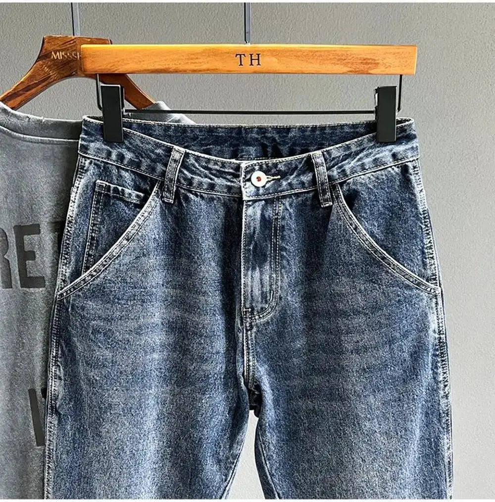 Men's blue denim jeans with a loose tapered fit, Korean vintage streetwear style