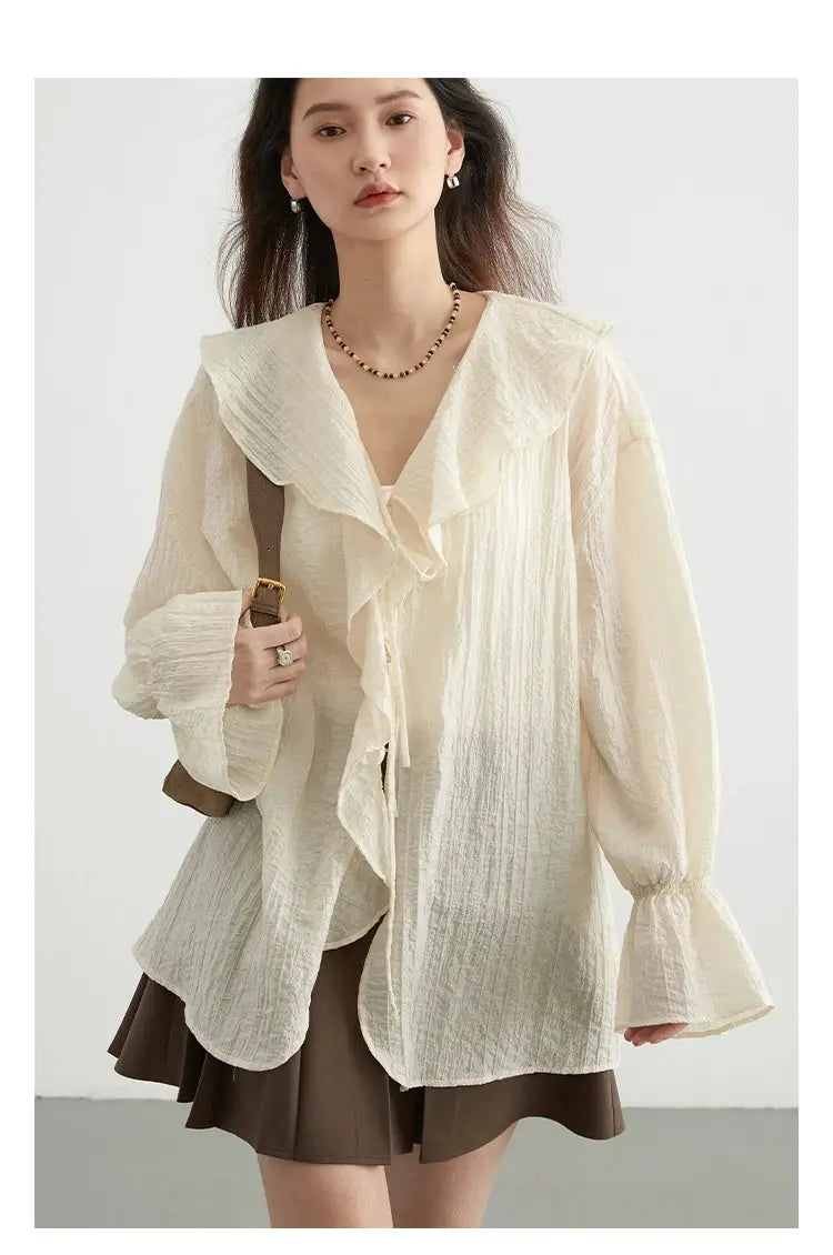 CHIC VEN women's shirt in ivory textured fabric with ruffled collar, V-neck lace-up front, and loose bell sleeves
