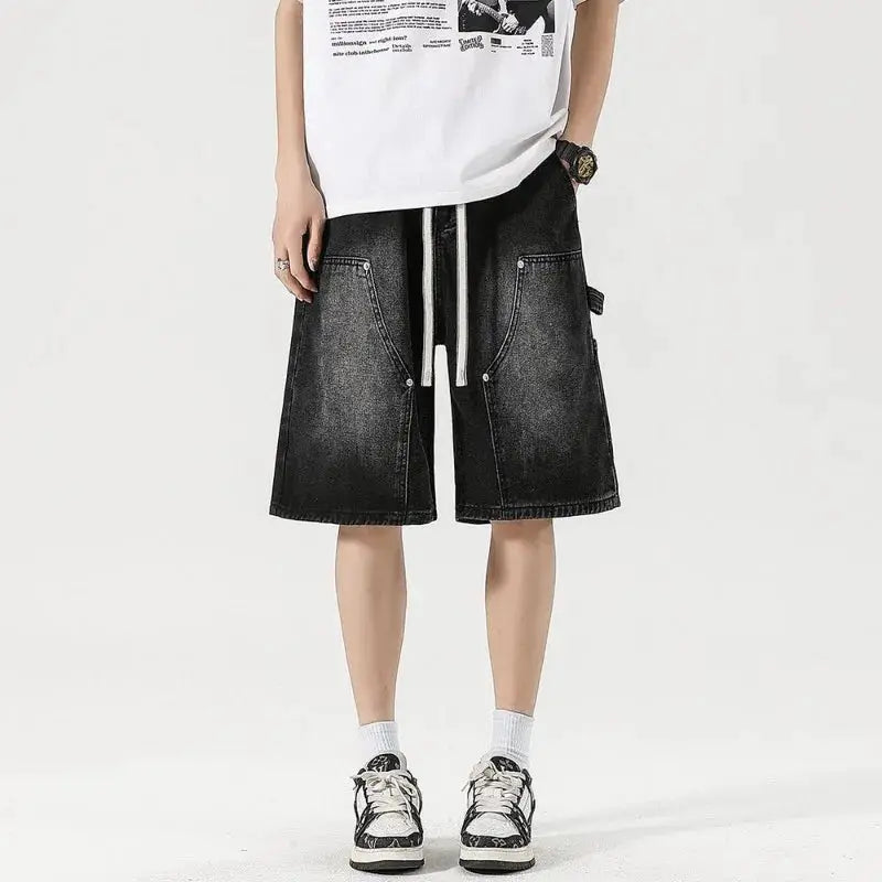 Men's denim shorts by Simples Market, black faded cargo moto style knee-length with white drawstrings.