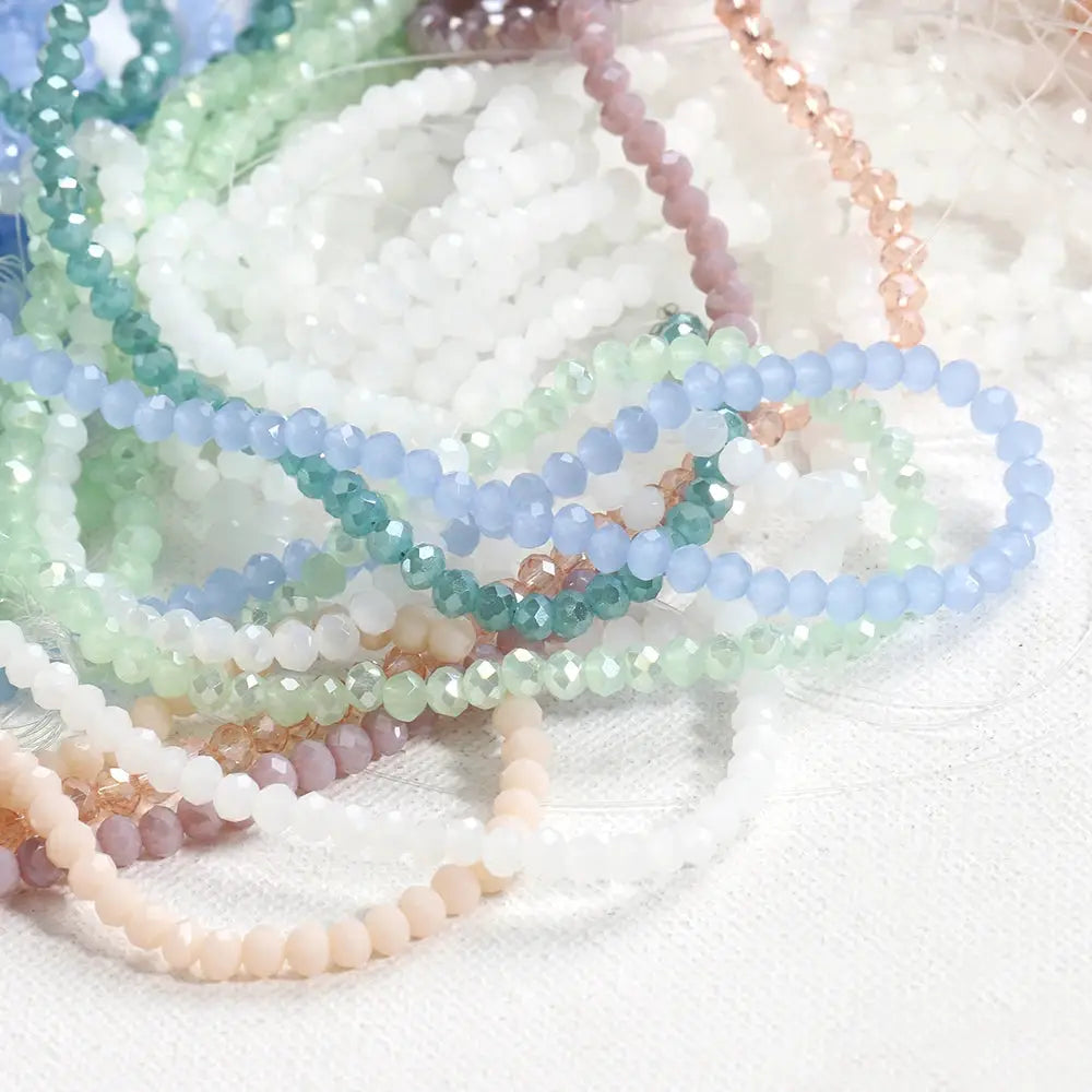 Crystal glass rondelle beads, 4mm faceted spacers in pastel multicolor, pack of 120.