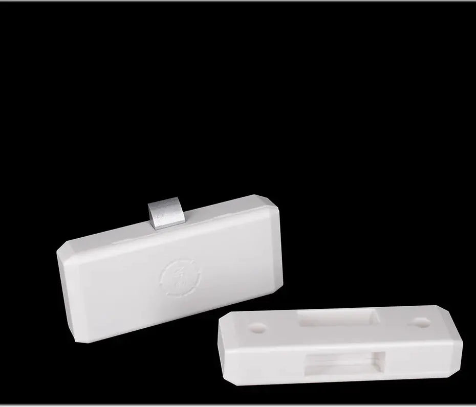 White smart drawer lock module, keyless NFC sensor lock for file cabinets; two plastic housings.
