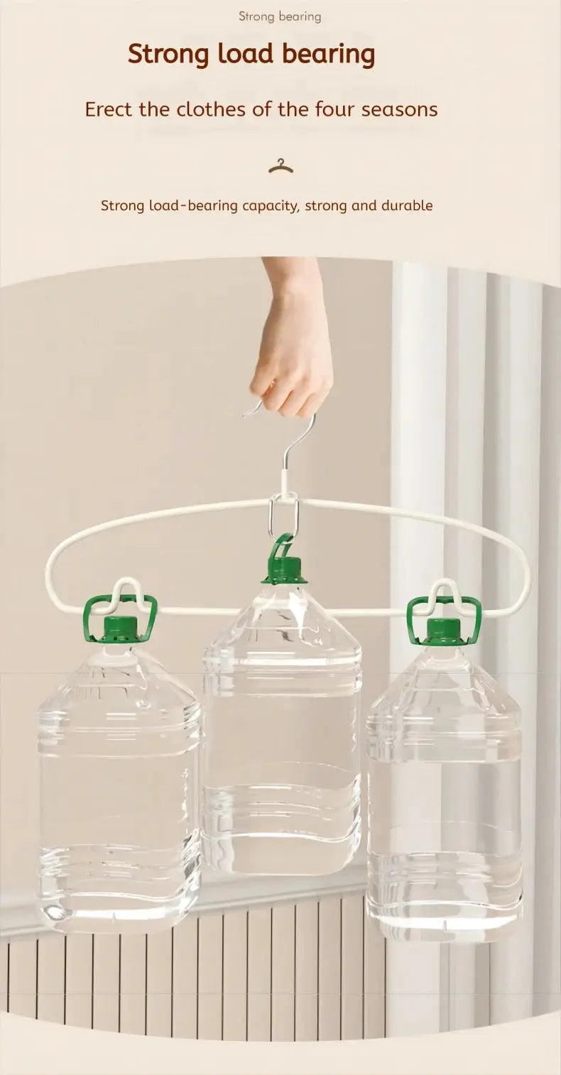 Simple white clothes hanger rack with three green non-slip clips holding large water bottles