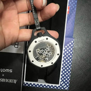 Royal Oak style wristwatch replica with black leather strap and transparent case back