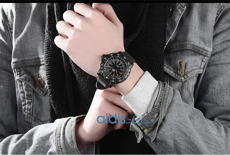 Addies military tactical watch on man's wrist; black strap, rugged multi-dial bezel