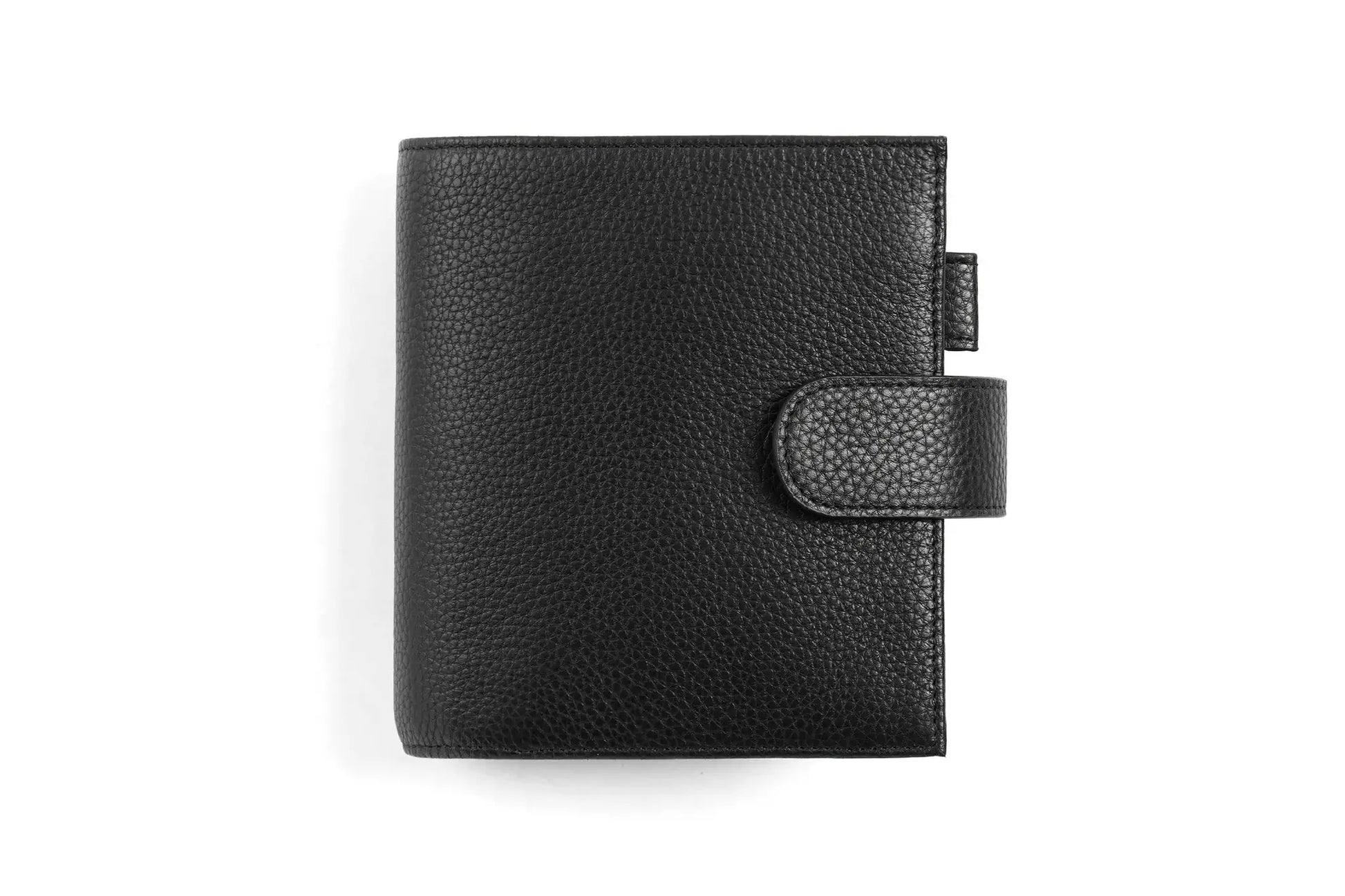 Moterm Luxe 2.0 pocket-size black pebble-grain leather planner with strap closure.