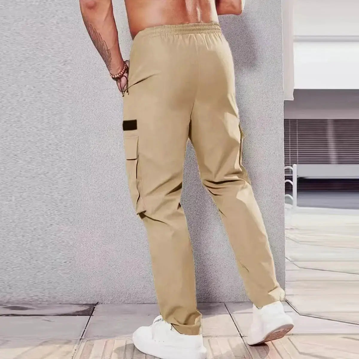 Men's khaki cargo pants with multiple pockets and a straight-leg fit