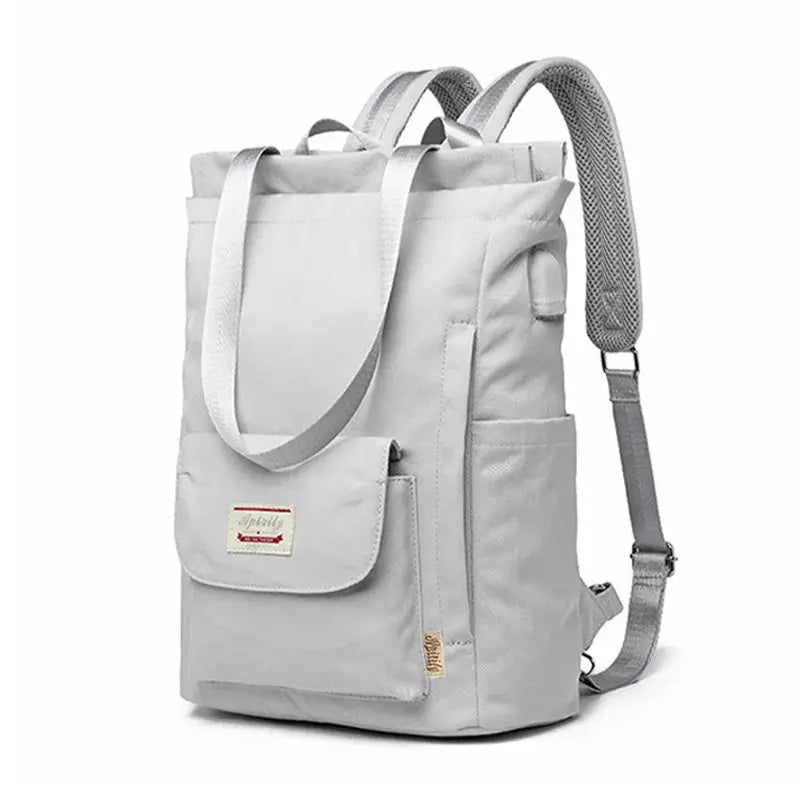 Simples Market women's waterproof Oxford canvas laptop backpack in light gray with front pocket