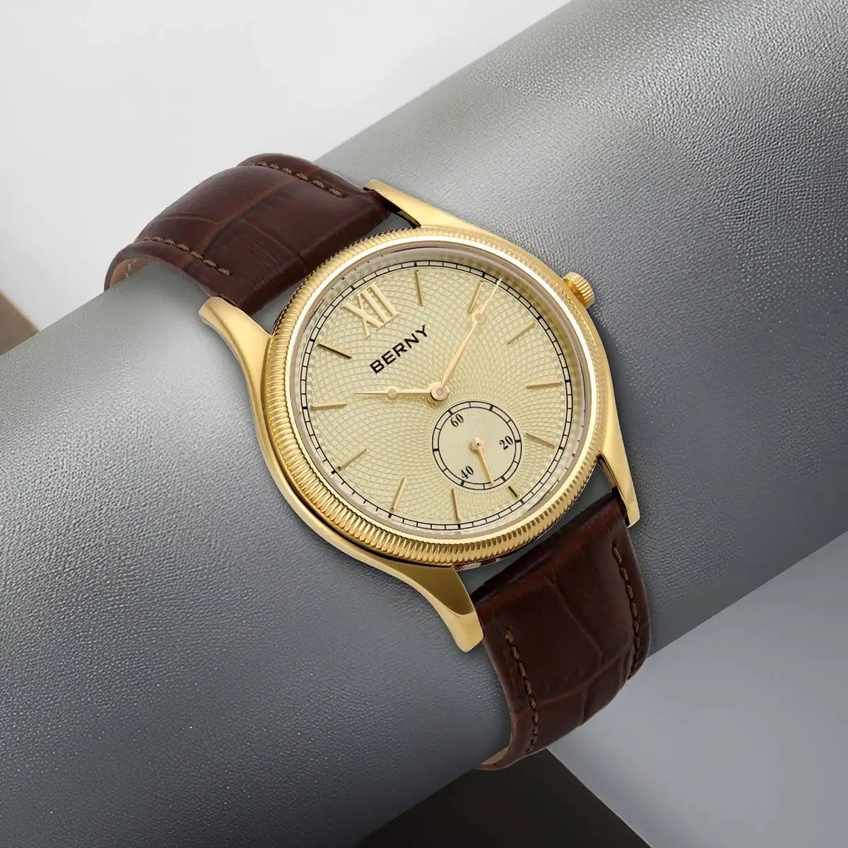 BERNY men's luxury dress watch with gold-tone case, cream dial, and brown leather strap