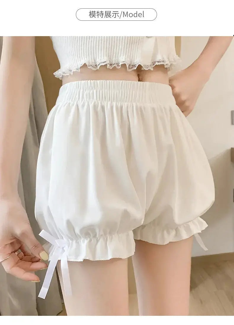 Women's satin bloomers with elastic waist, ruffled hems and side bows in white