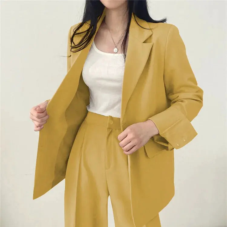 Mustard yellow women's 2-piece blazer and pants suit set with white top
