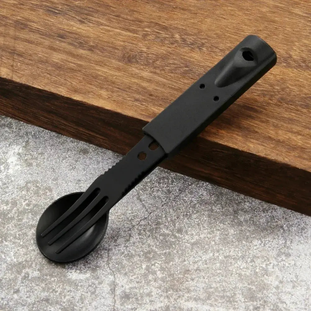 Camping utensil, black multifunction tool with serrated spoon-fork head for hiking and picnics