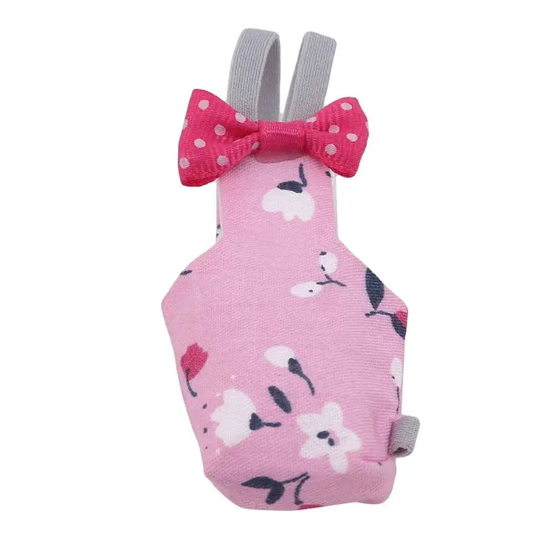 Parrot diaper by Simples Market with bowtie in pink floral fabric and pink polka-dot bow for small birds