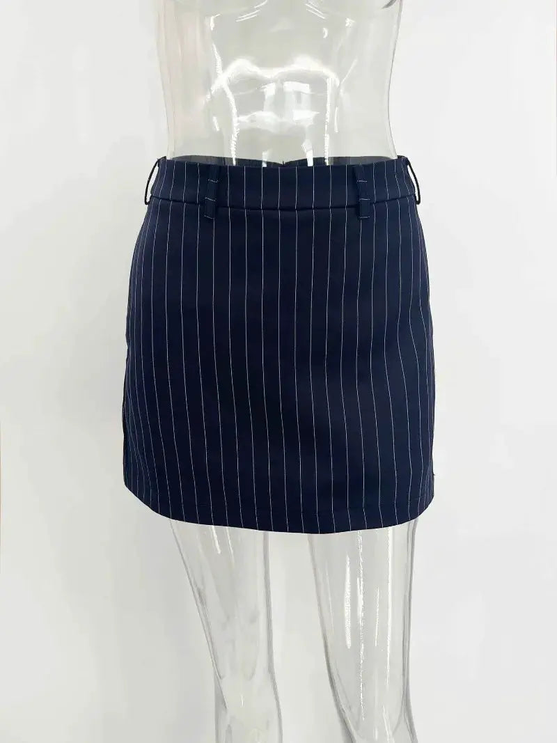 Navy pinstripe mini skirt with belt loops, slim-fit pencil silhouette on mannequin