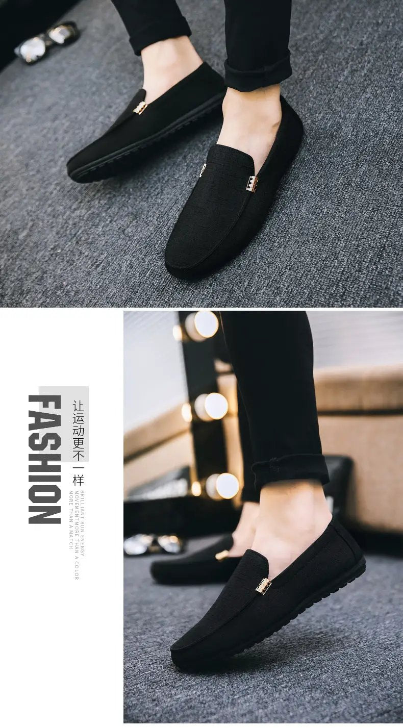 Men's black canvas slip-on loafers with a gold-tone buckle, casual dress driving shoes.