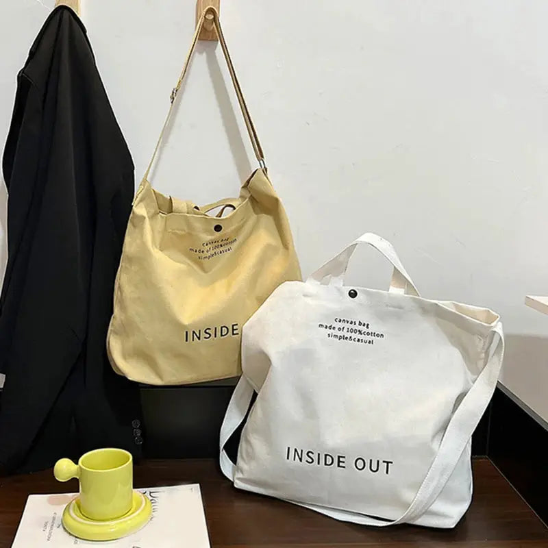 Two canvas bags: beige crossbody and white tote by Simples Market, large-capacity INSIDE OUT