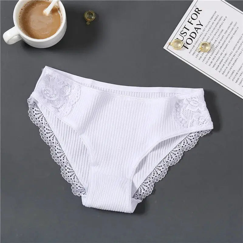 White cotton women's panties with lace-trimmed sides, low-rise brief with ribbed fabric
