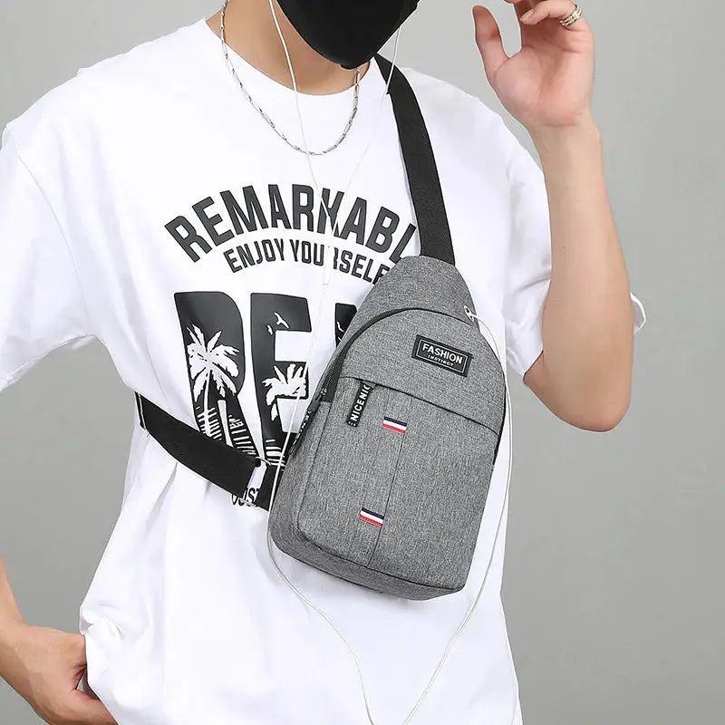 Chest bag Simples Market grey fabric crossbody with large capacity, one-shoulder design and front zip pockets