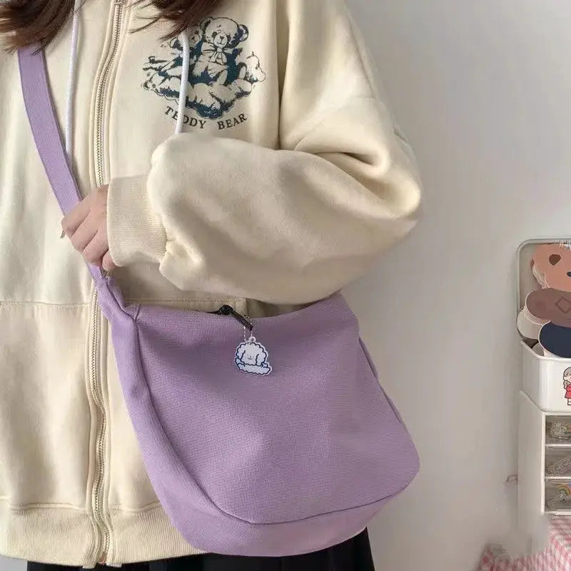 Shoulder bag lavender purple crossbody with cloud charm zipper pull; large-capacity handbag