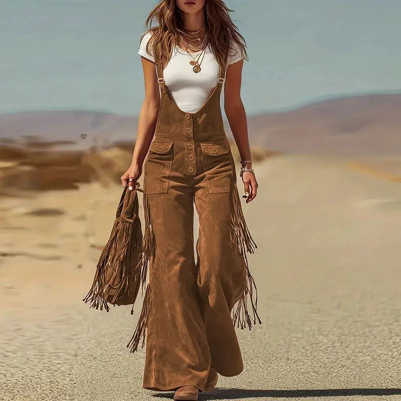 Brown suede overalls romper with fringe sides, button-front straps and wide legs.