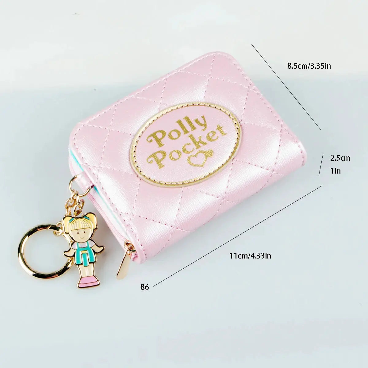 Pink quilted zipper wallet with Polly Pocket logo, keychain charm, compact card holder by Simples Market