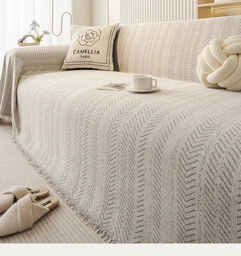 3-seater sofa cover in cream beige fishbone pattern; full set with non-slip, stain-resistant fabric.