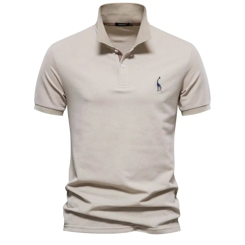 AIOPESON men's polo shirt, beige cotton short-sleeve with blue chest logo.