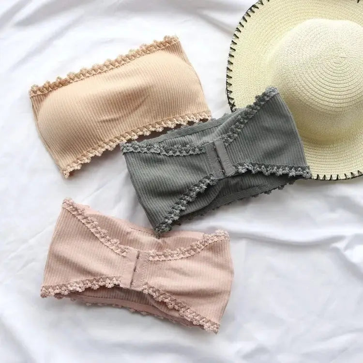 3-pack strapless bras in peach, gray, and blush with ribbed fabric, lace trim, and back closures