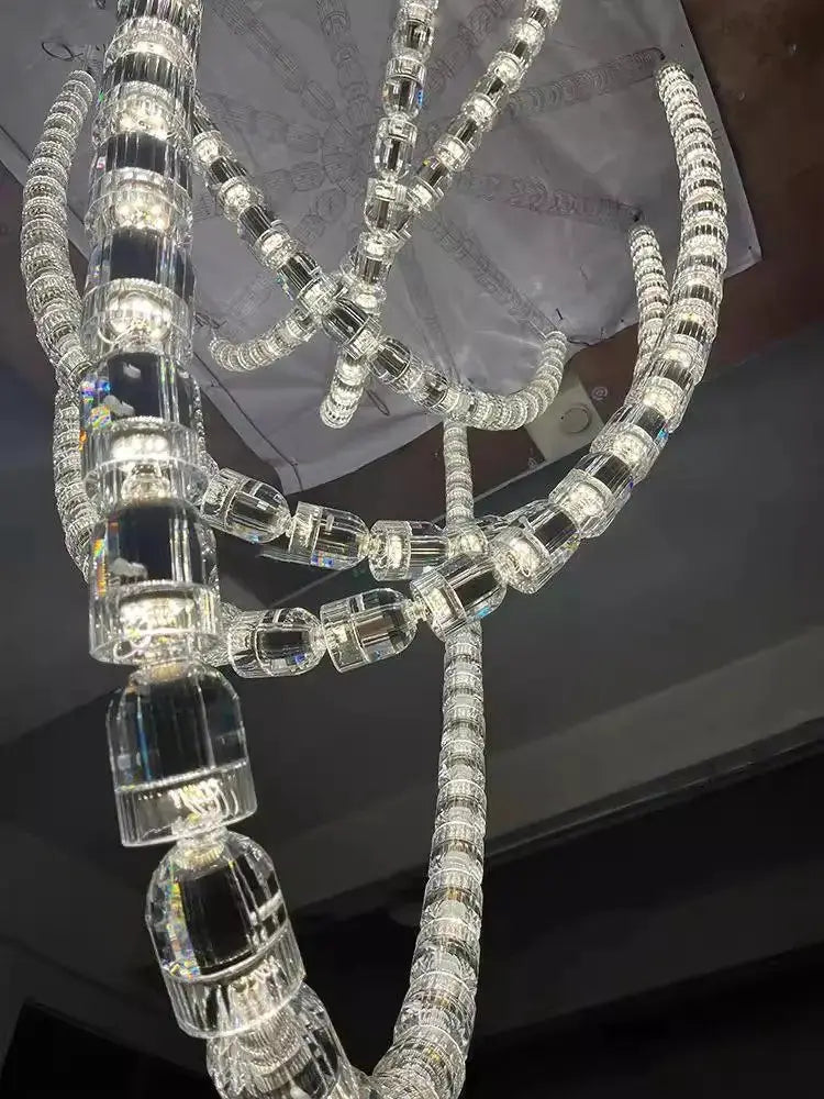Chandelier ceiling light with multi-strand crystal acrylic beads and adjustable chain length for living room.