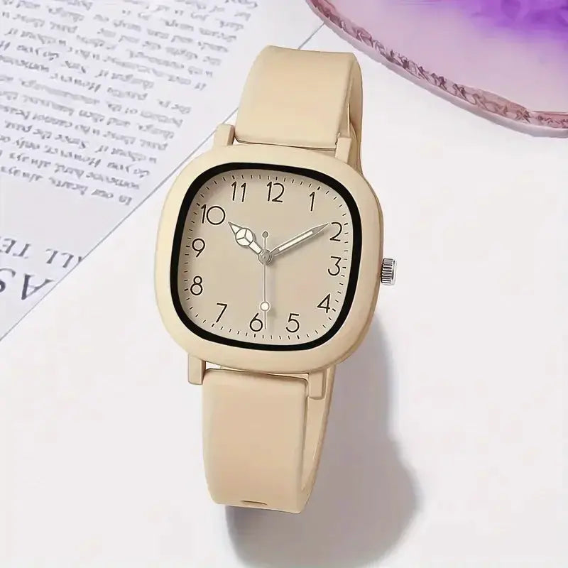Beige silicone band women's wristwatch with a square case and Arabic numeral dial