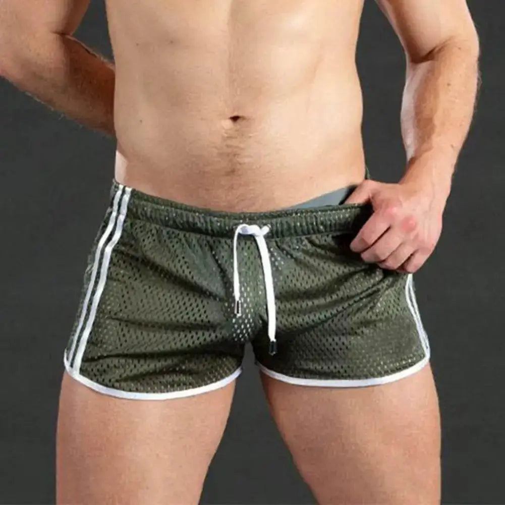 Men's olive green mesh sport shorts with white trim, drawstring waist, quick-dry fabric