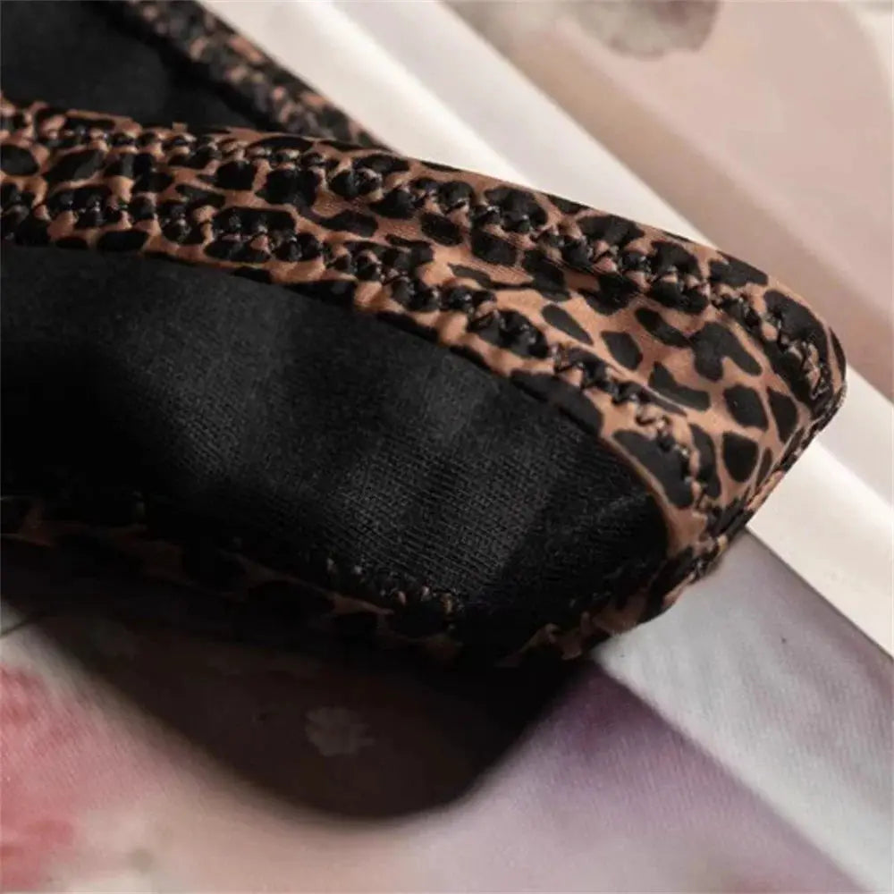 Leopard print thong by Simples Market in ice silk seamless fabric.