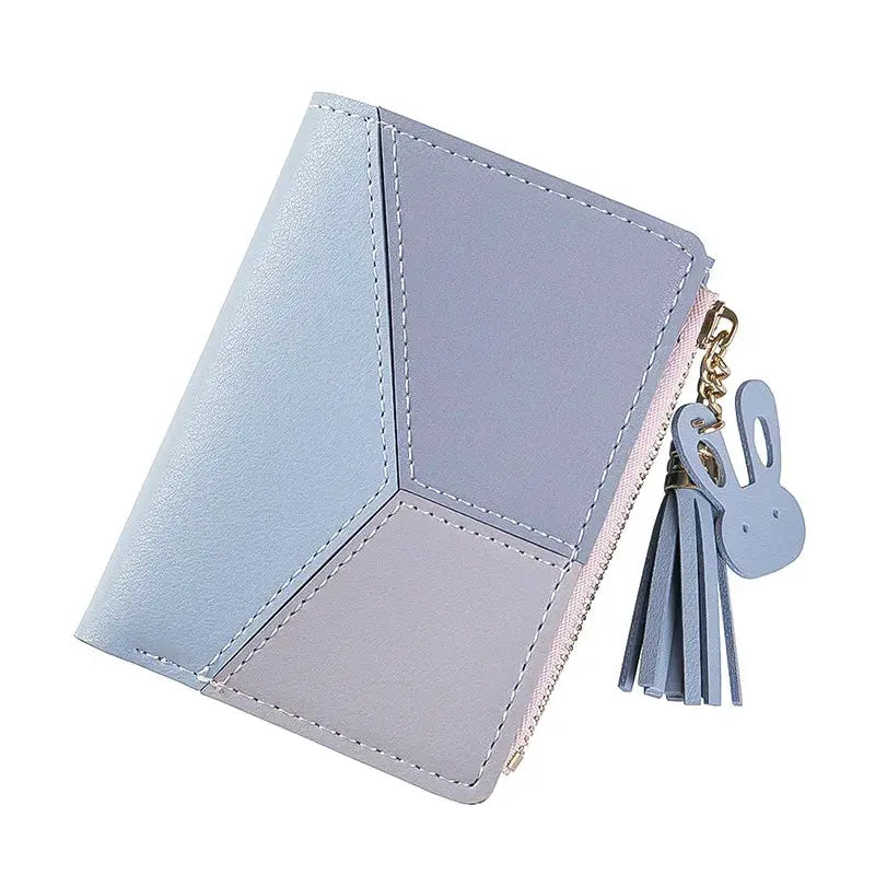 Simples Market PU leather wallet clutch in pastel color-block design with zip and bunny tassel