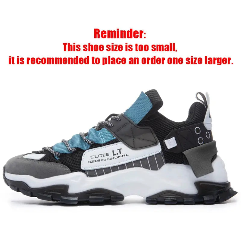Men's casual sneakers with teal laces, black and gray upper, chunky white midsole