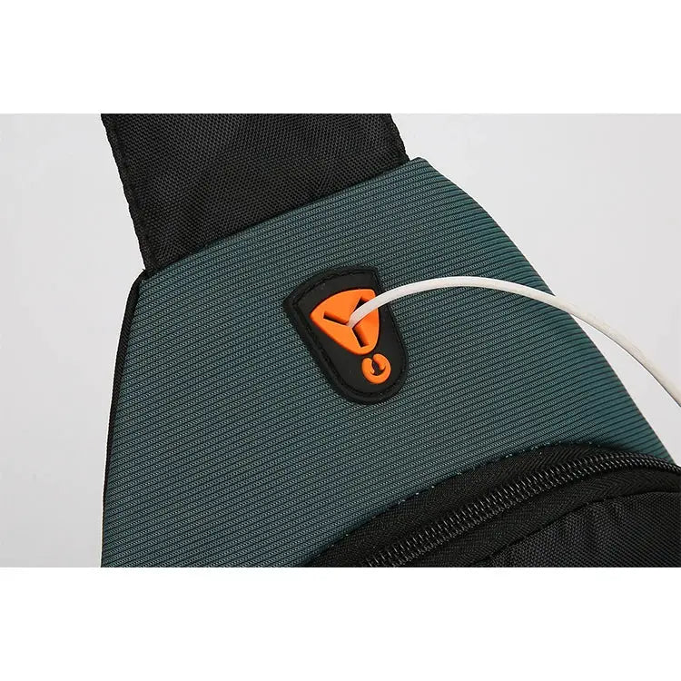 Men's outdoor crossbody shoulder bag by Simples Market in teal waterproof fabric with orange buckle
