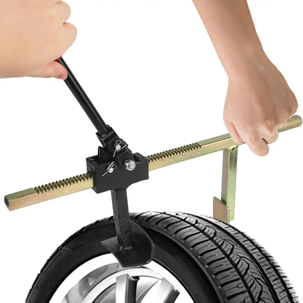 Manual tire changer bead breaker tool with steel guard and clamp for bead removal on a wheel