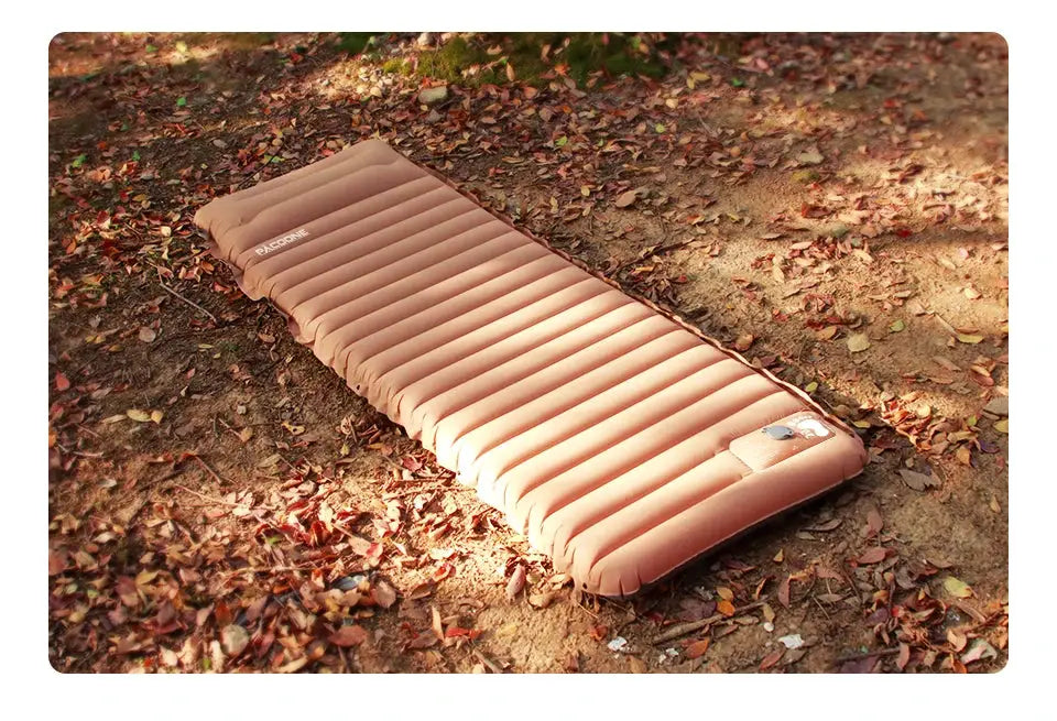Ultralight self-inflating air mattress sleeping pad in tan for camping and beach picnics by Simples Market