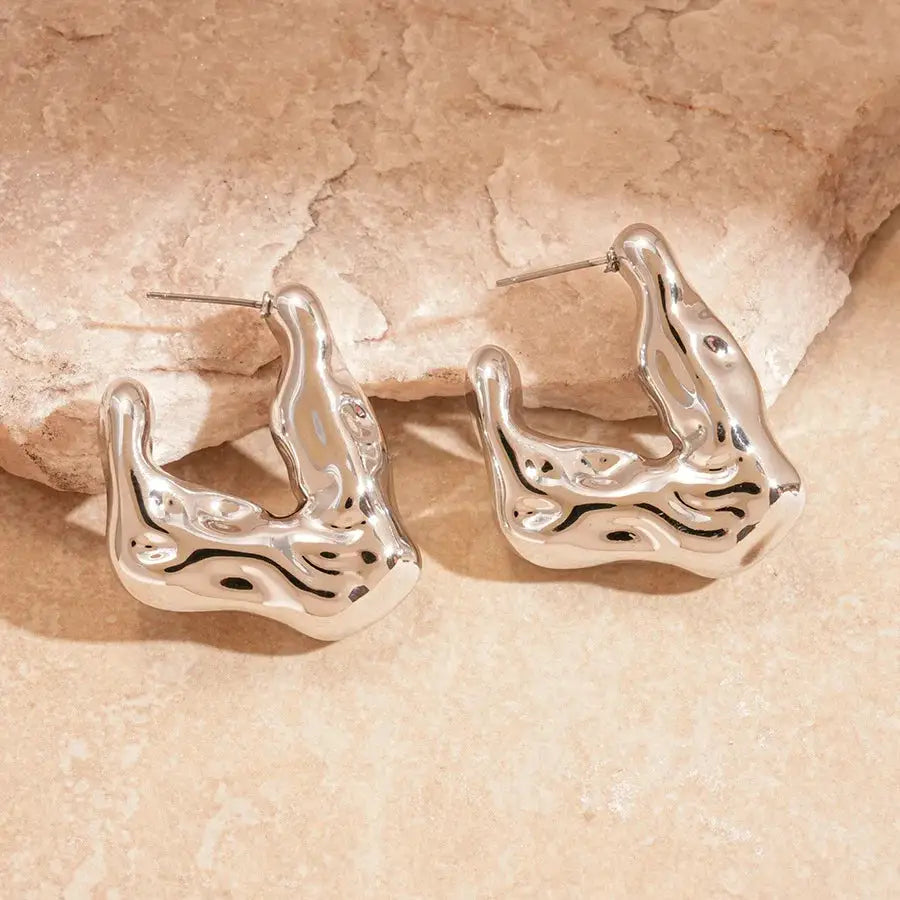 Oval acrylic stud earrings, silver-toned irregular pleated design, pair, Simples Market