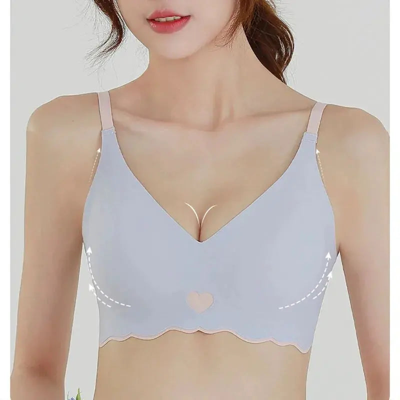 Women’s seamless bralette in light blue ice silk with adjustable straps, deep V-neck and heart-cutout.