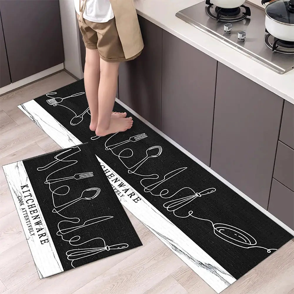 Non-slip kitchen mat runner pair; black crystal velvet with white utensil line art, absorbent kitchen rugs.
