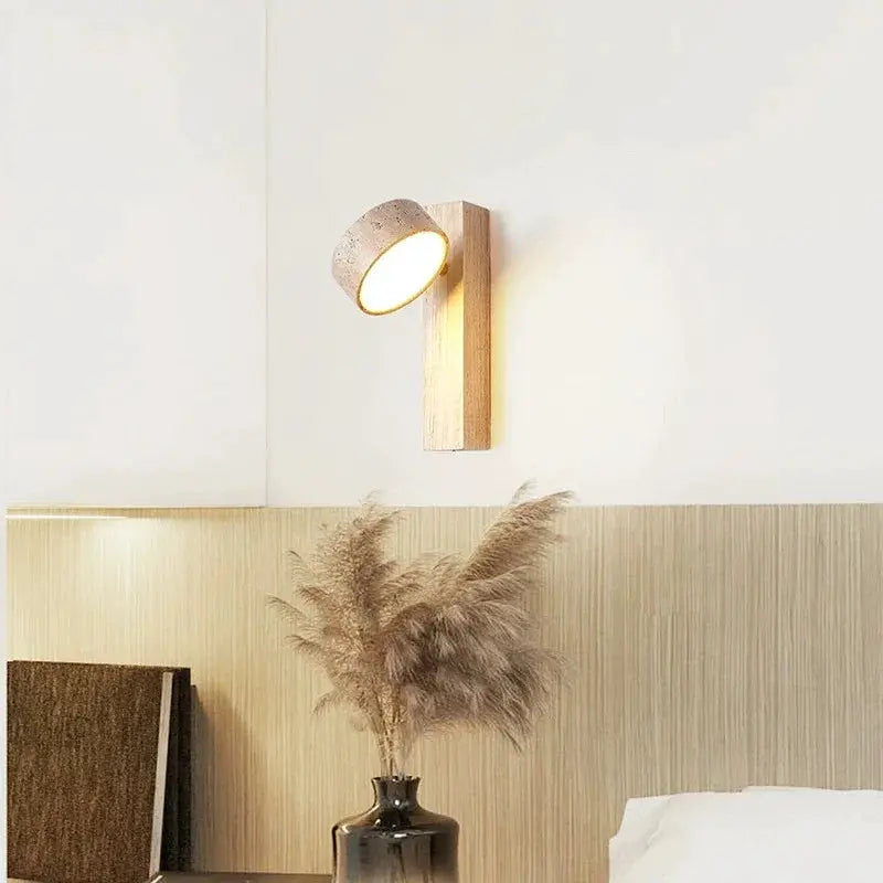 Wooden cream bedside wall lamp with pull switch and rotatable LED light.